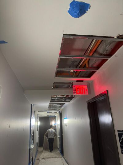 Disruptive construction and missing ceilings to replace faulty fire sprinkler systems at The Bowie in Austin.